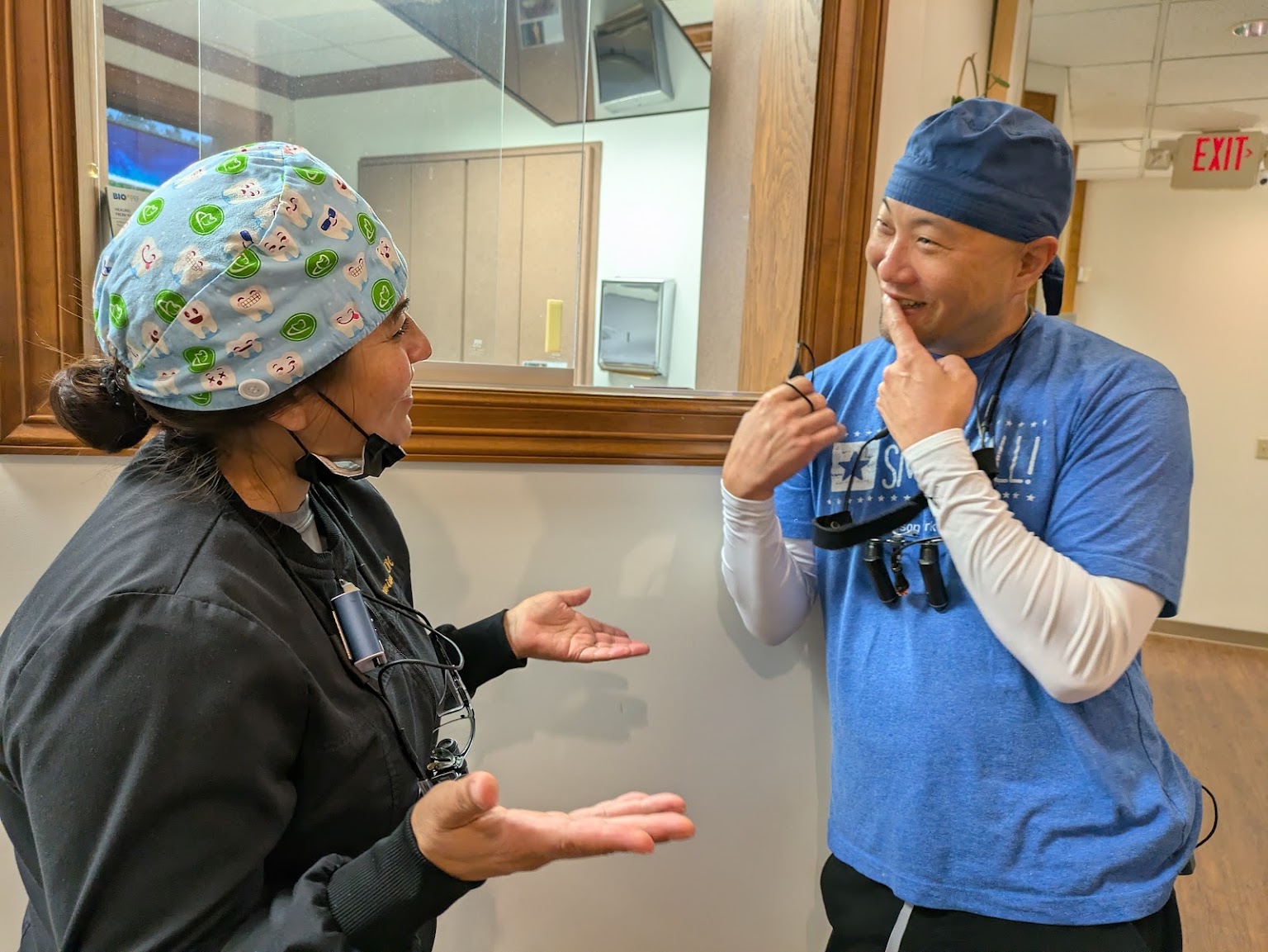 Two of the clinical team talking between appointments